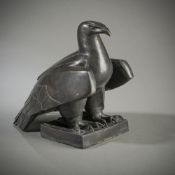 A PATINATED BRONZE EAGLE