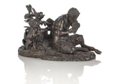A BRONZE GROUP WITH FLUTE-PLAYING FAUN AND TWO PUTTI