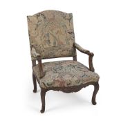 A CARVED WALNUT FAUTEUIL