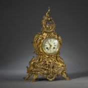 A ROCOCO STYLE GILTBRASS PENDULE