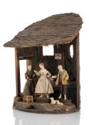 A KITCHEN INTERIOR WITH THREE FIGURINES