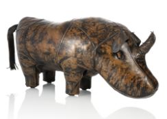 A RHINO SHAPED SMALL LEATHER FOOT SETTEE