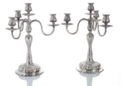 A PAIR OF FIVE LIGHT SILVER CANDELABRA
