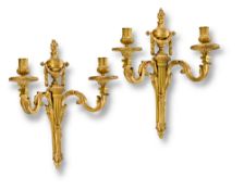 A PAIR OF GILTBRONZE TWO LIGHT WALL APPLIQUES