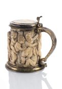 A BAROQUE VERMEIL MOUNTED IVORY TANKARD