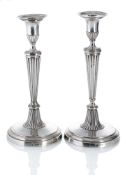 A PAIR OF NEOCLASSICAL SILVER CANDLESTICKS