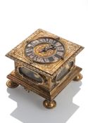 A FINE GERMAN BAROQUE OROMOLU HORIZONTAL TABLE CLOCK