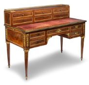 A LOUIS XVI GILT BRONZE MOUNTED MAHOGANY BUREAU PLAT
