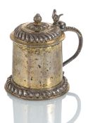 A SMALL VERMEIL TANKARD