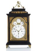 AN EBONIZED WOOD STUTZUHR TABLE CLOCK