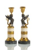 A PAIR OF RUSSIAN ORMOLU AND PATINATED BRONZE CANDLESTICKS