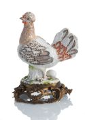 A BRONZE MOUNTED MEISSEN PORCELAIN HEN