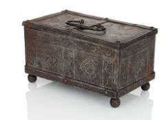 A SMALL ENGRAVED BAROQUE IRON CASKET