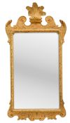 A CLASSICAL GILTWOOD AND METAL MOUNTED MIRROR