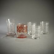 FOUR GLASS BEAKER AND A HANDLED BEAKER
