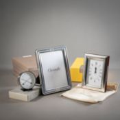 A TABLE CLOCK, 4 PHOTO FRAMES AND A THERMO-HYGROMETER