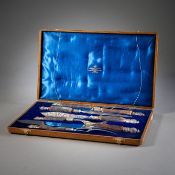 A SILVER MOUNTED SEVEN-PIECE HORN SERVING SET