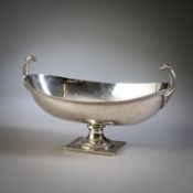 AN ITALIAN FOOTED SILVER BOWL WITH EAGLE HEADS