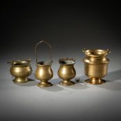 FOUR BRASS HOLY WATER VESSELS