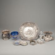 AN OPENWORK BASKET, A CANDLESTICK, A CACHEPOT, TWO BOTTLE STANDS AND A SUGAR BOWL