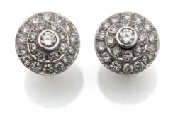 Pair of diamond stud earrings with Entourage