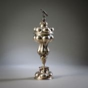 A LARGE BAROQUE STYLE SILVER CUP AND COVER