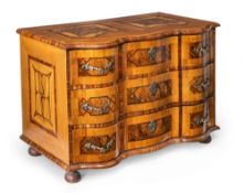 A GERMAN OAK WALNUT AND FRUITWOOD MARQUETRY COMMODE