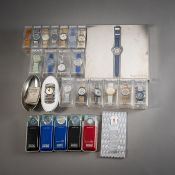 Collection of 24 Swatch watches