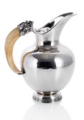 A SILVER WINE JAR WITH BOAR TUSK