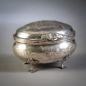 A PARTIAL GILT FLORAL PATTERN SILVER SUGAR BOX ON FOUR FEET
