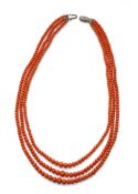 AN OLD THREE ROW CORAL NECKLACE