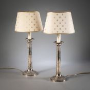 A PAIR OF SILVER CANDLESTICKS - MOUNTED AS TABLE LAMPS
