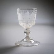 A BAROQUE CUT GLASS CUP WITH BIRDS AND ARCHITECTURE