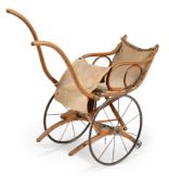 A VINTAGE DOLL'S CARRIAGE