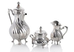 A COFFEE POT, A SUGAR BOWL AND A CREAMER