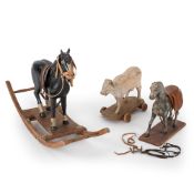 ROCKING HORSE AND TWO TOY FIGURES / COW AND HORSE