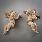 A PAIR OF WINGED PUTTI