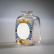 A SMALL PHARMACY GLASS BOTTLE