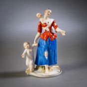 A BEGGAR WOMAN WITH HER CHILDREN