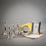 FOUR CANDLESTICKS, A TABLE CLOCK AND A THERMO-HYGROMETER