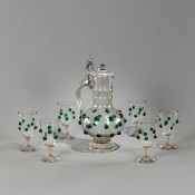 A CARAFE AND SIX GLASSES