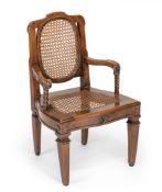 A SOUTH GERMAN WALNUT ARMCHAIR