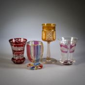 TWO  SOUVENIR GLASSES, A BEAKER AND A WINE GLASS