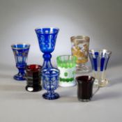 EIGHT CUPS AND BEAKERS