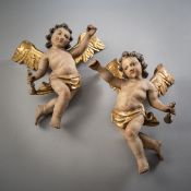 A PAIR OF WINGED ANGELS