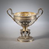 A PARTIAL GILT OPENWORK FOOTED BOWL WITH GLASS LINER