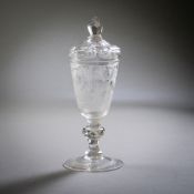 A BAROQUE CUT GLASS CUP AND COVER