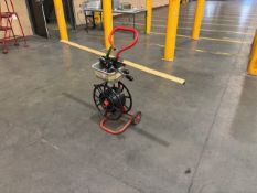 Manual pallet strapper