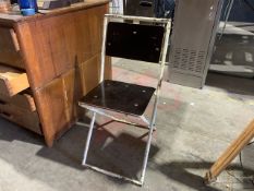 White Metal Foldout Chair