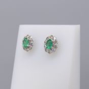 Pair Of 18ct White Gold Emerald & Diamond Cluster Studs